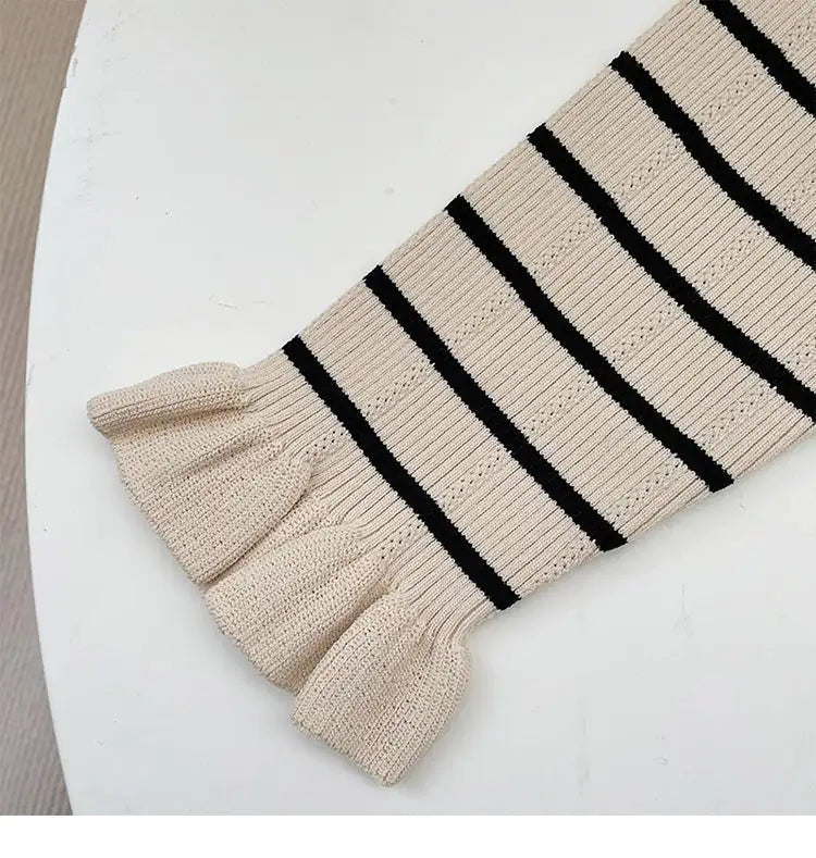 Chic Striped Knit Midi Dress with Flattering Fit and Versatile Style