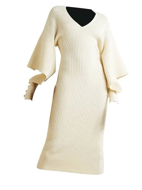 Elegant Knit Dress with Dramatic Shoulder Detail and Flattering Silhouette